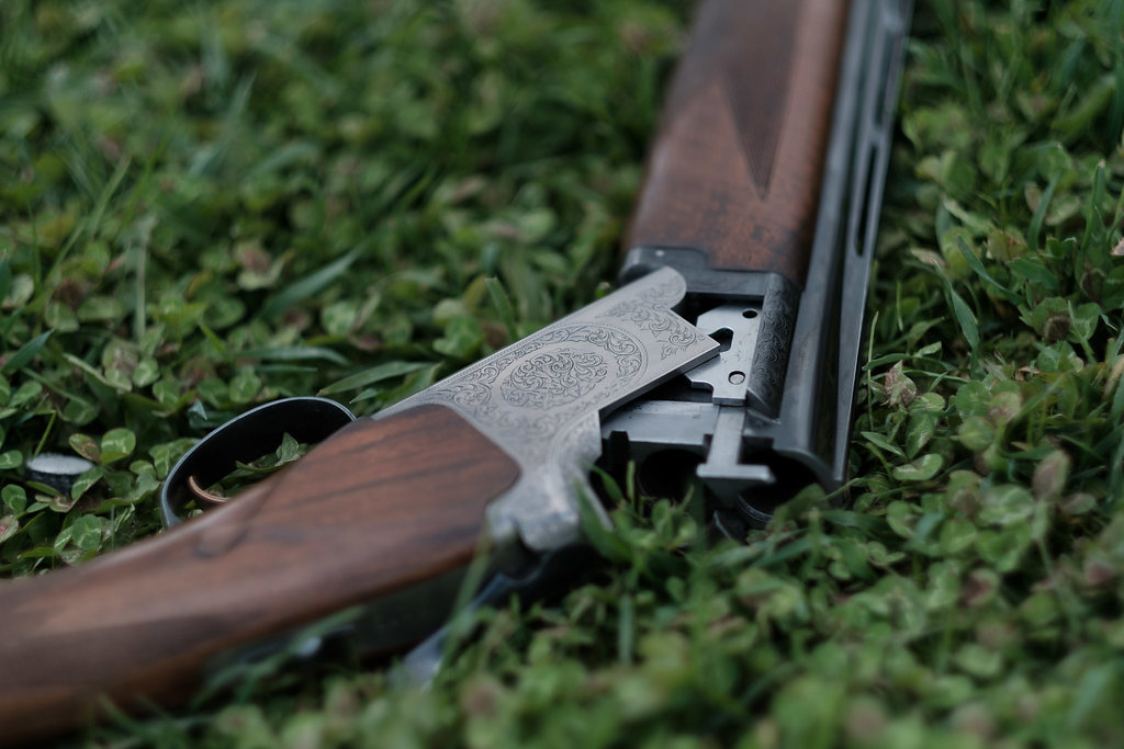 Detail of an engraved over-and-under shotgun